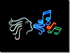 Neon sign of musical notes coming from singer