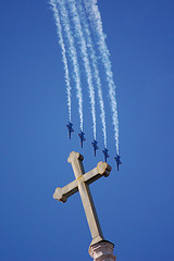 cross and jet planes